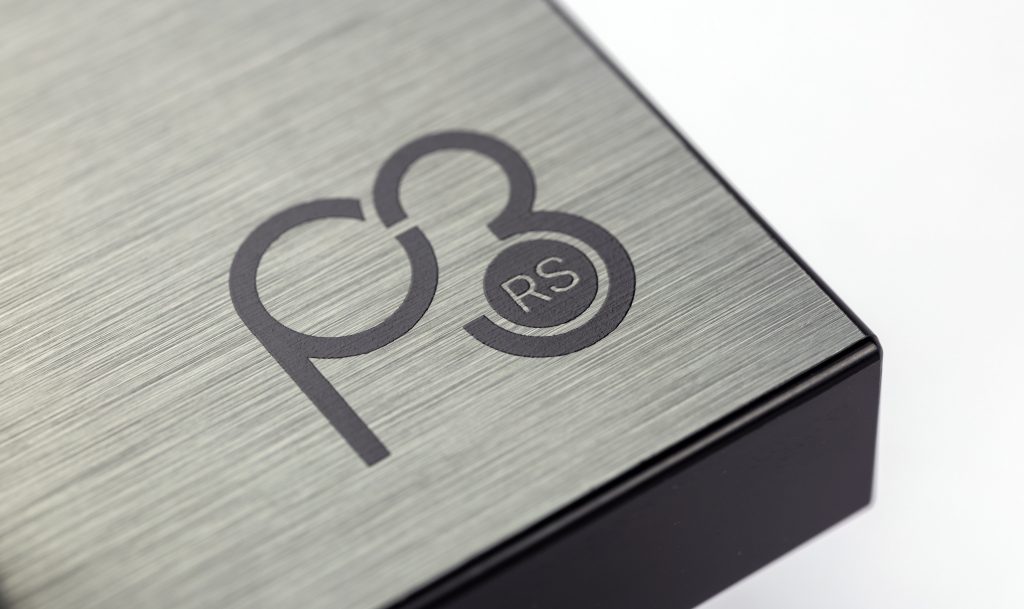 An image featuring a close up of the logo of the Rega Planar 3 RS Turntable.