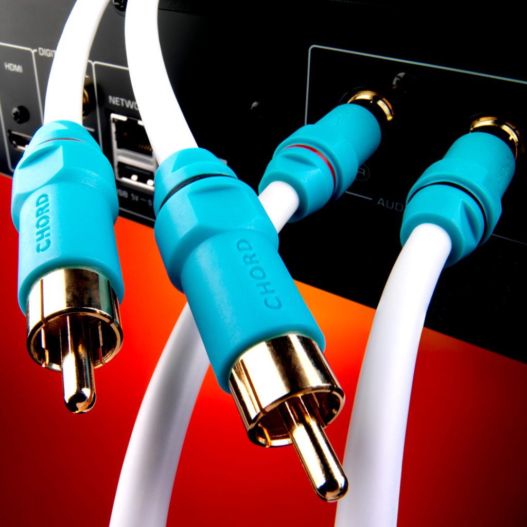 An image depicting a Chord C-Line RCA cable being plugged into a piece of HiFi equipment.