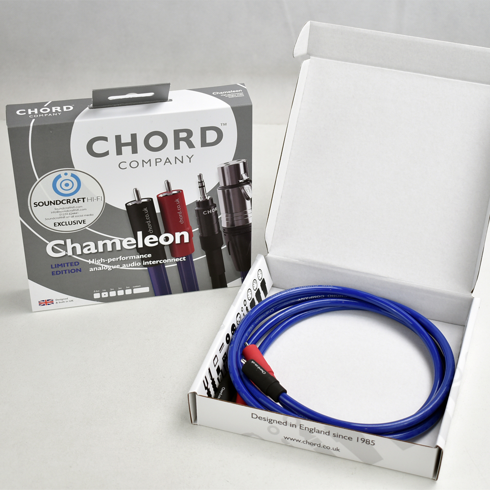 An image depicting a Chord Chameleon RCA cable on the right in its box with its sleeve on the left.