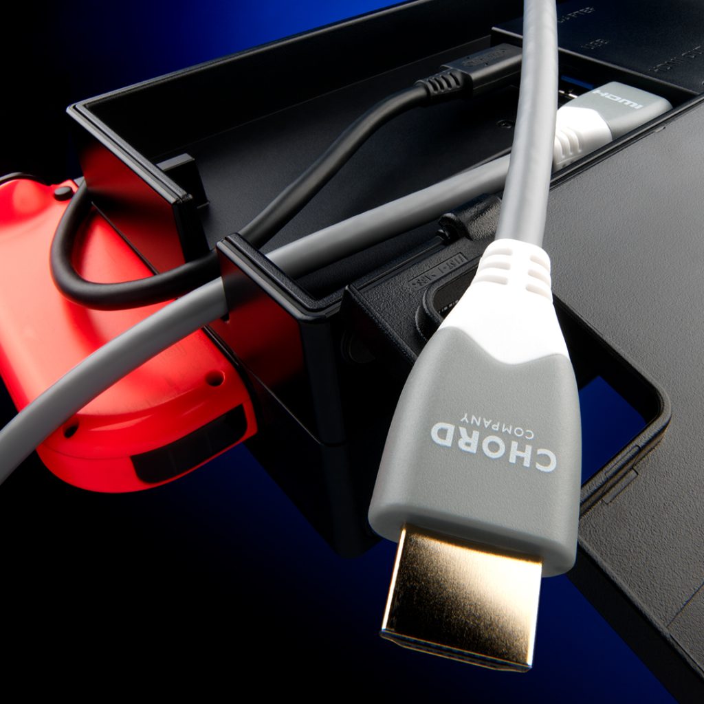 An image depicting the Chord Leyline HDMI Cable being plugged into a Nintendo Switch dock.