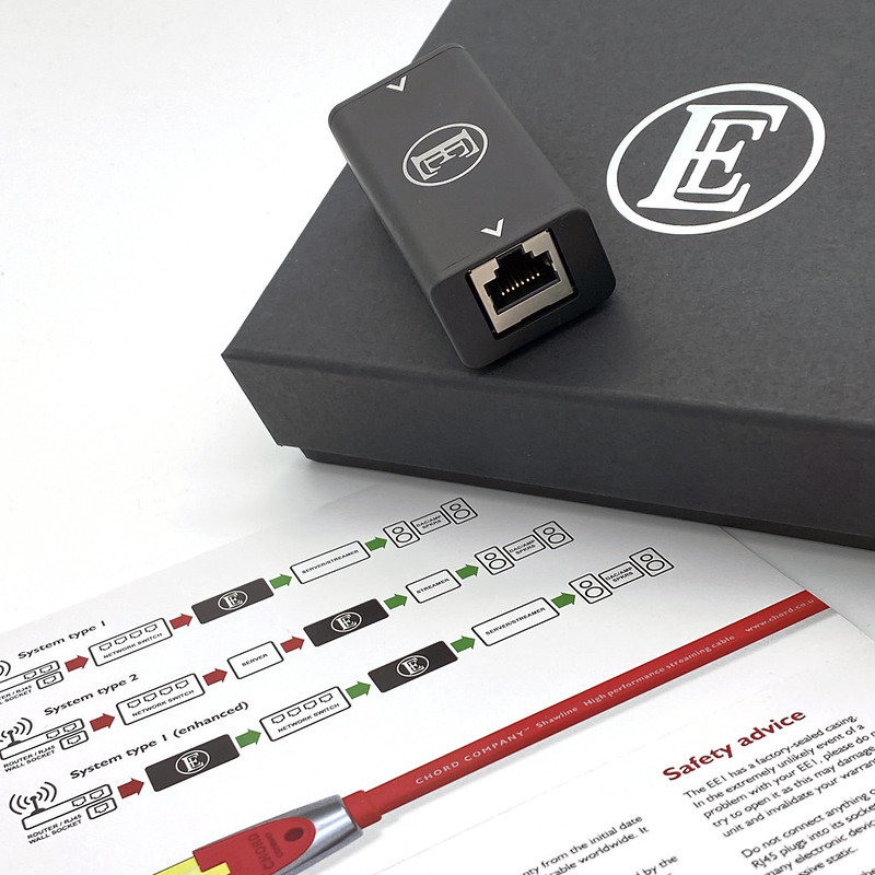 An image of the English Electric EE1 on top of its box. To the left of it is its instruction manual on how to use it.